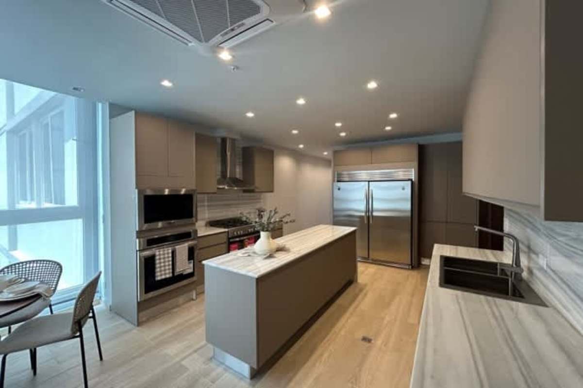 Modern family room or den with large windows in Punta Paitilla Panama