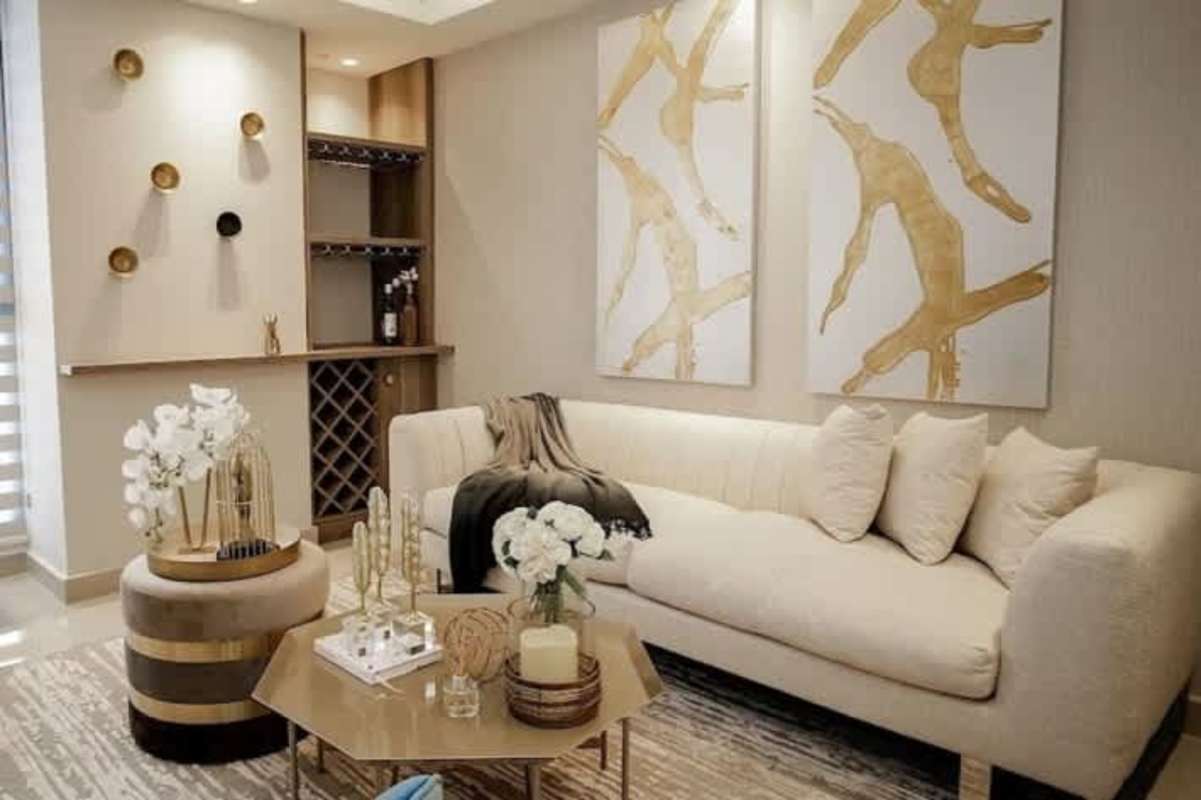 Master bedroom with beige headboard, decorative accents in Portofino Tower Betania Panama City