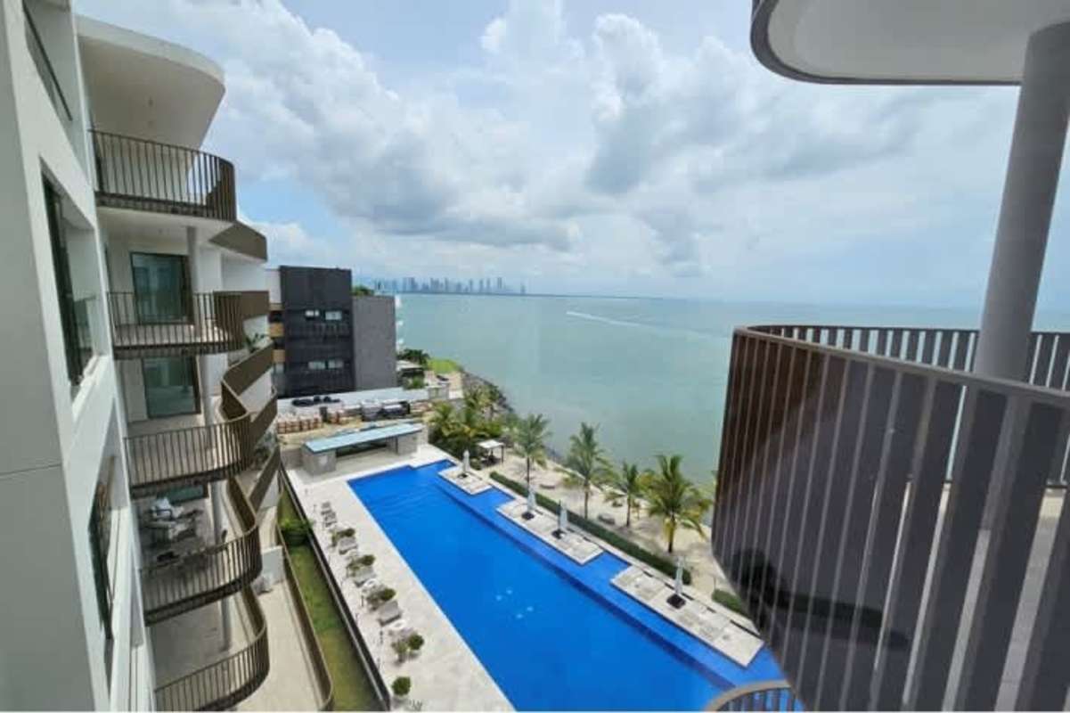 Oceanfront infinity pool overlooking skyline at Ocean Reef Residences Punta Pacifica