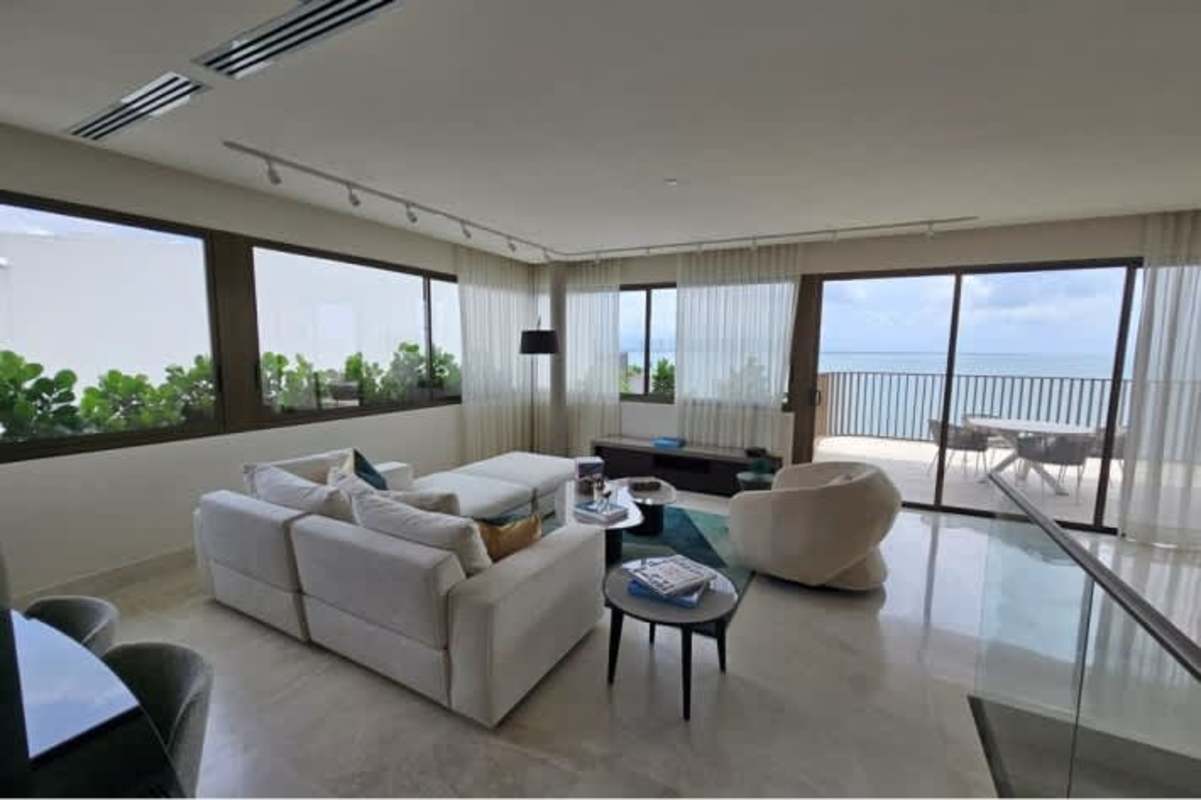 Artificial private beach area with hammocks and lounge chairs at Ocean Reef Islands