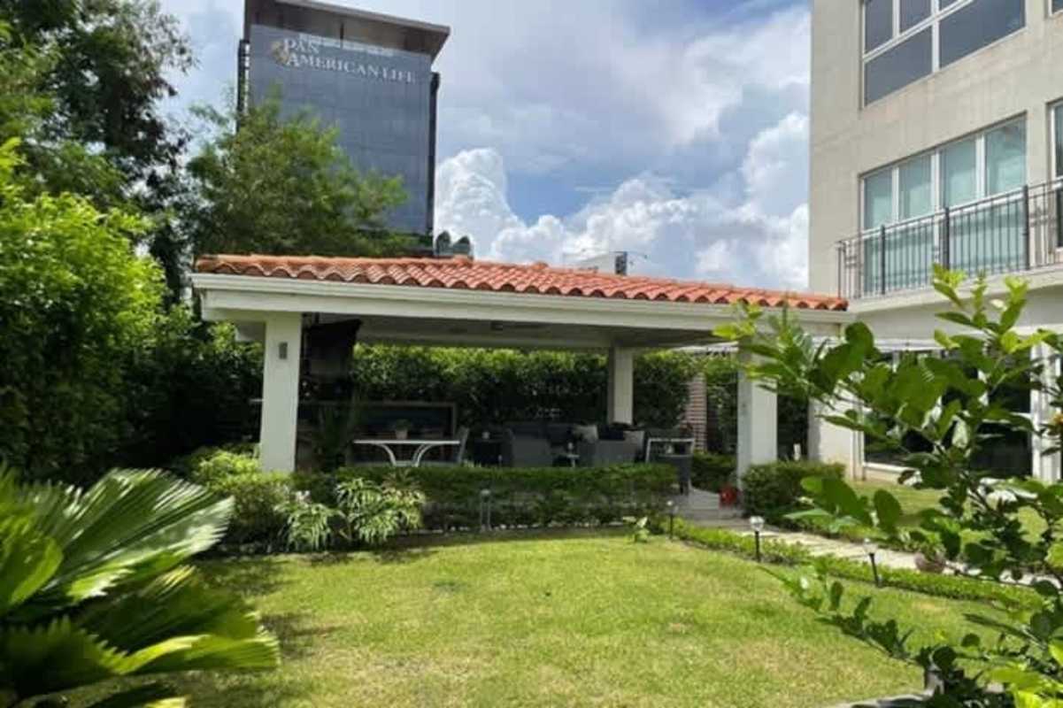 Spacious kitchen with European cabinetry and stone countertops in The Reserve Santa Maria Panama