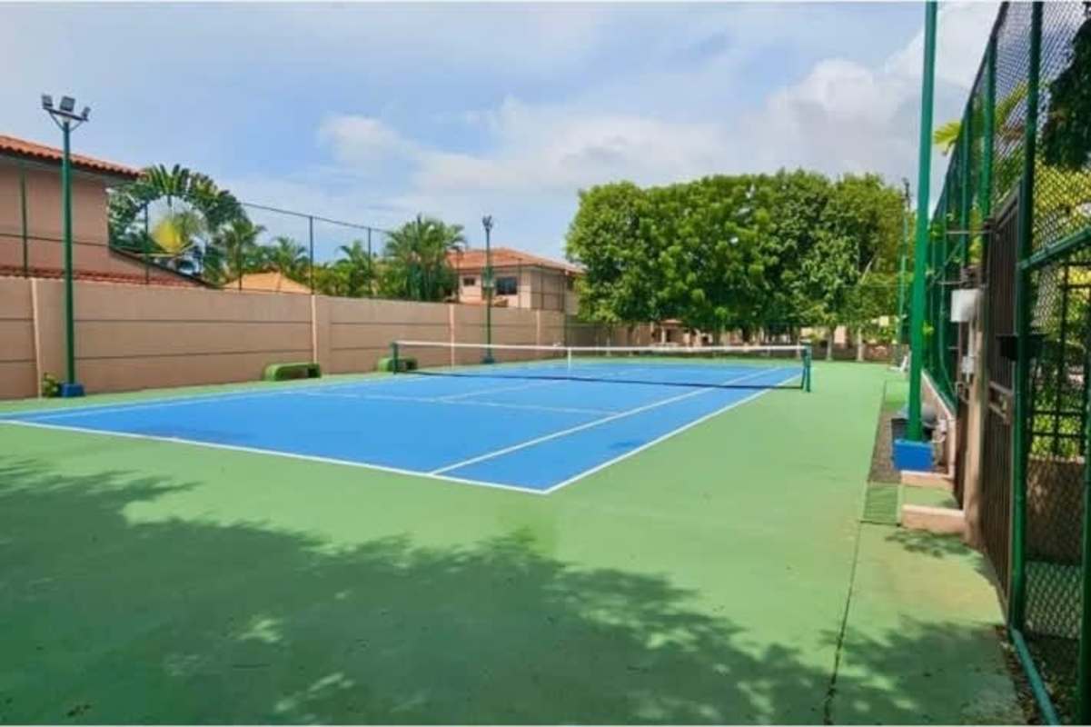 Spacious living dining with tile floors large glass windows duplex Costa Sur Panama