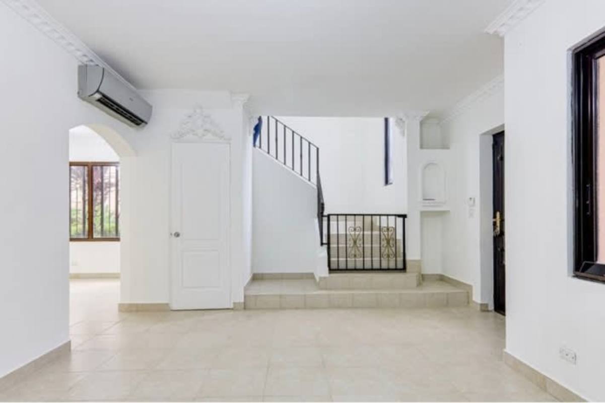 Granite counter kitchen equipped with stove oven hood in house Versalles Costa Sur Panama