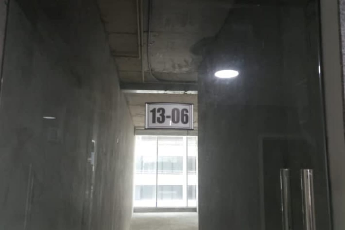 Modern lobby area of PH Atrium Tower with geometric wall panels and decorative lighting in Obarrio Panama