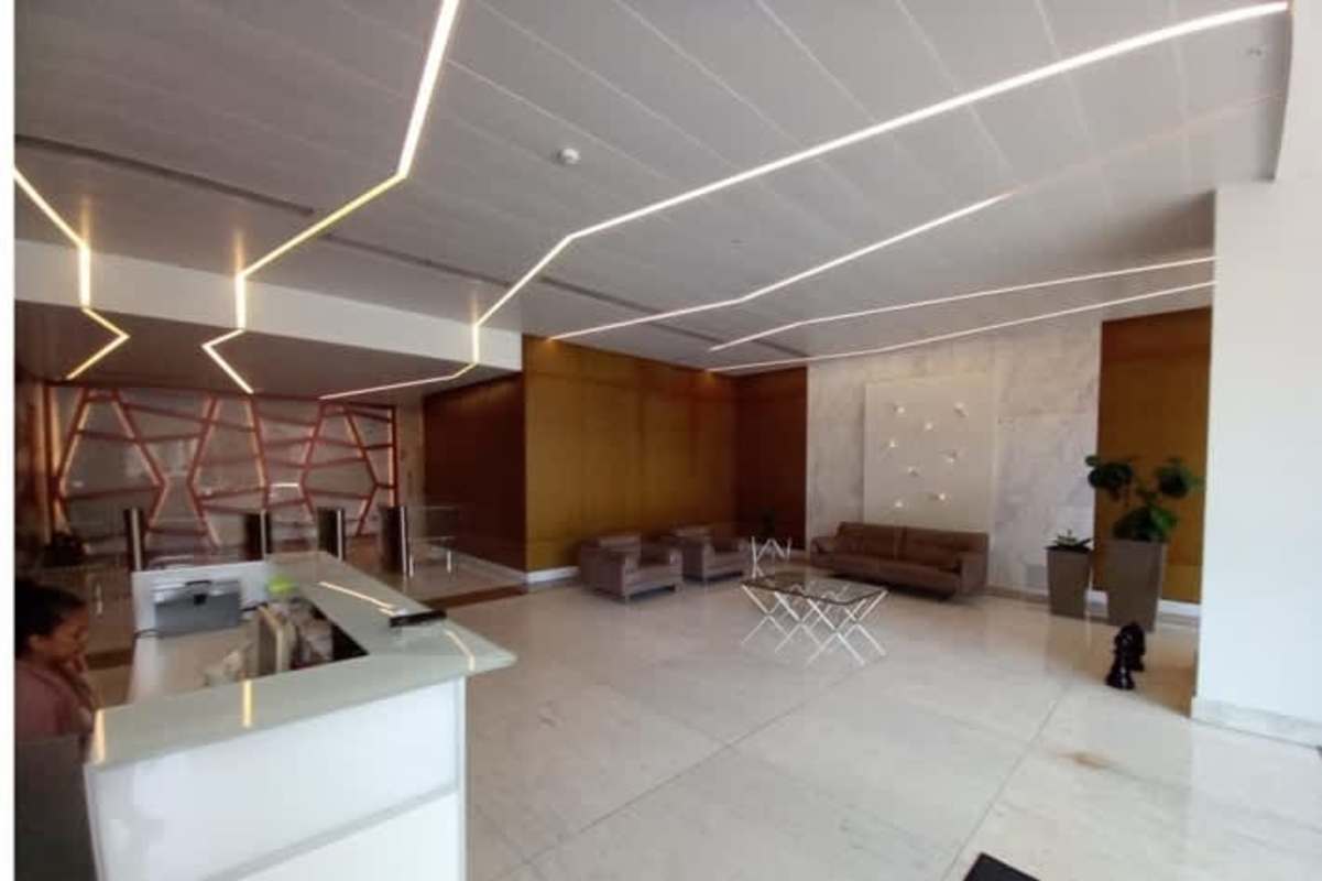 Glass office unit entrance door inside PH Atrium Tower Obarrio in unfinished condition