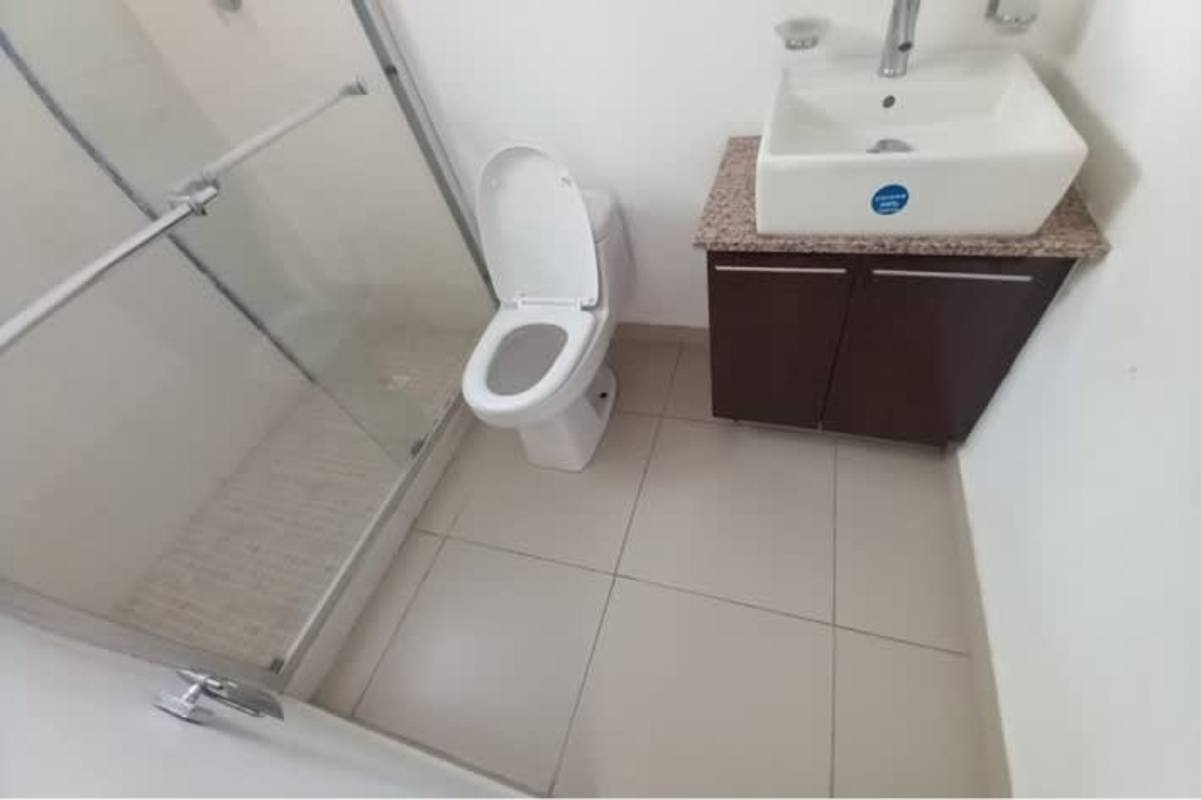 Modern bathroom with glass shower granite counter in Costa Sur Village Panama