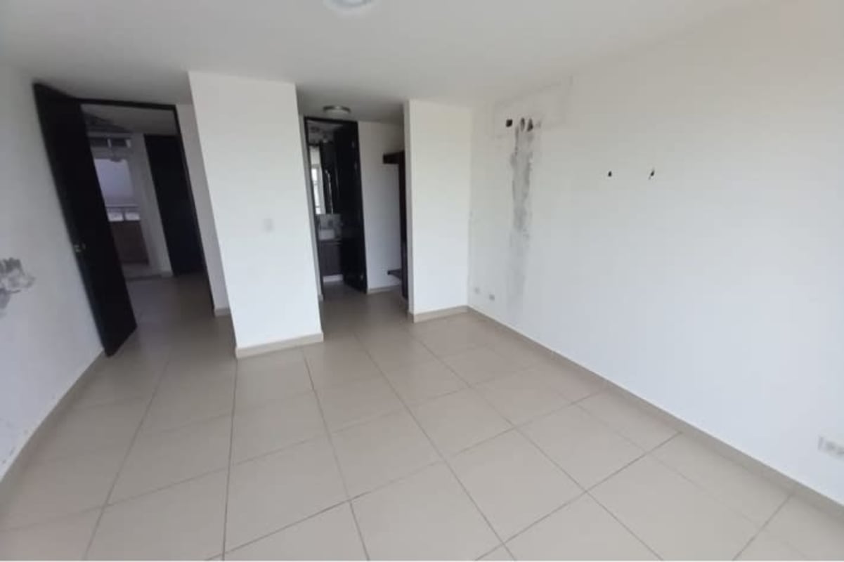 Empty bedroom with natural light large window at Costa Sur Village house for sale Panama