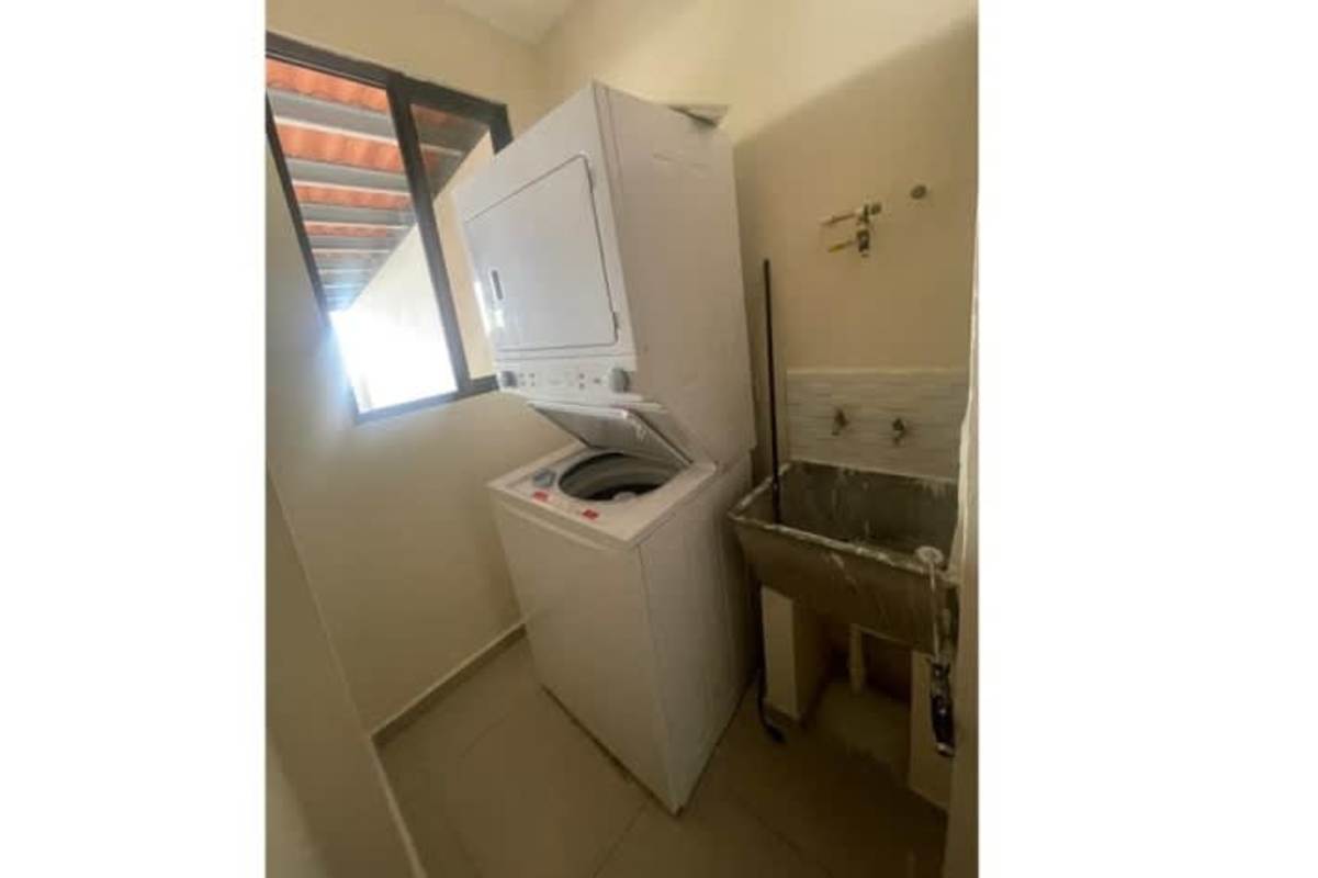 In-unit laundry space with washer hookup and utility sink PH Vía España Río Abajo Panama