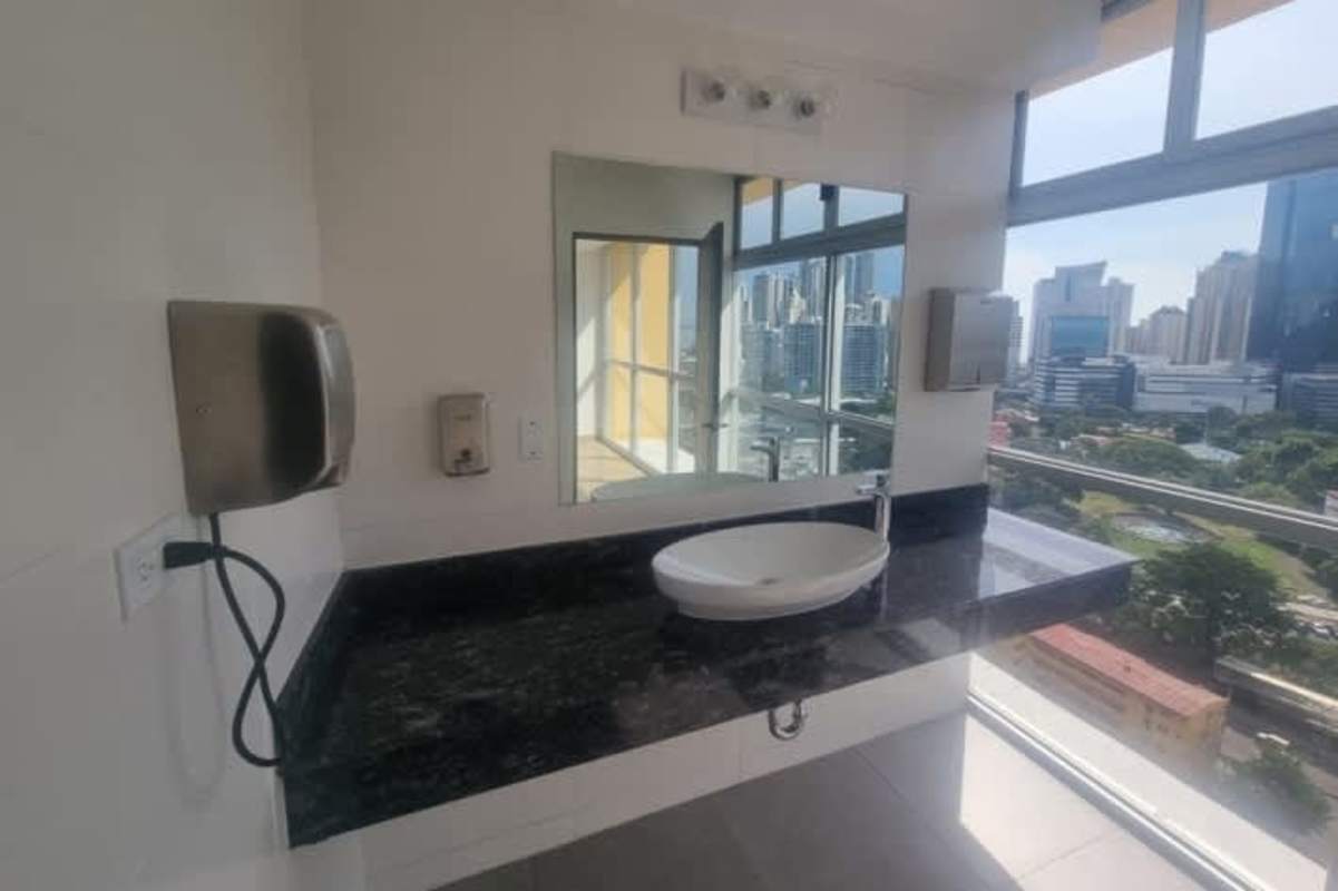 Bedroom with closet and large window city skyline view foreclosed at PH The One Tower Panama