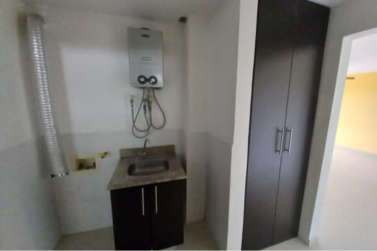 Utility room with heater, sink and storage PH Altamira Gardens Panama