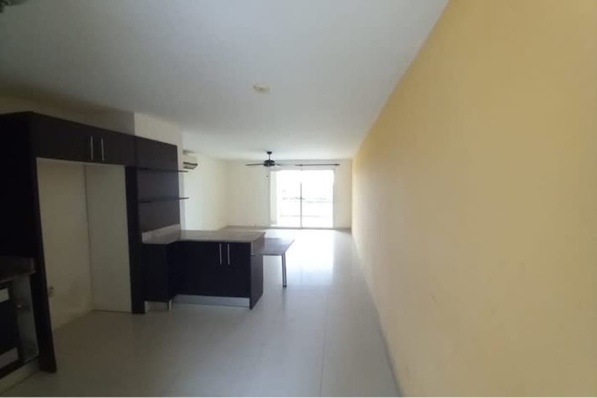 Open living dining with large window and kitchen at PH Altamira Gardens Ancon Panama