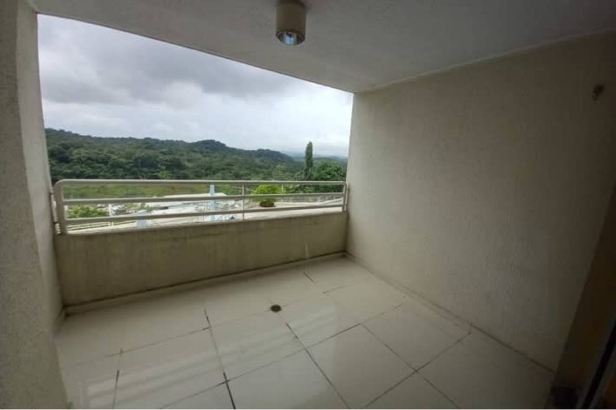 Covered balcony overlooking green hills PH Altamira Gardens Panama City