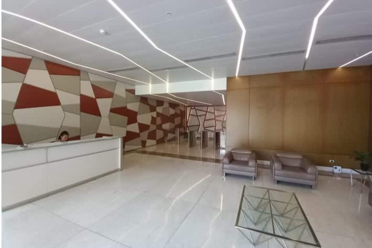 Modern skyscraper with glass and concrete exterior, Atrium Tower in Obarrio Panama