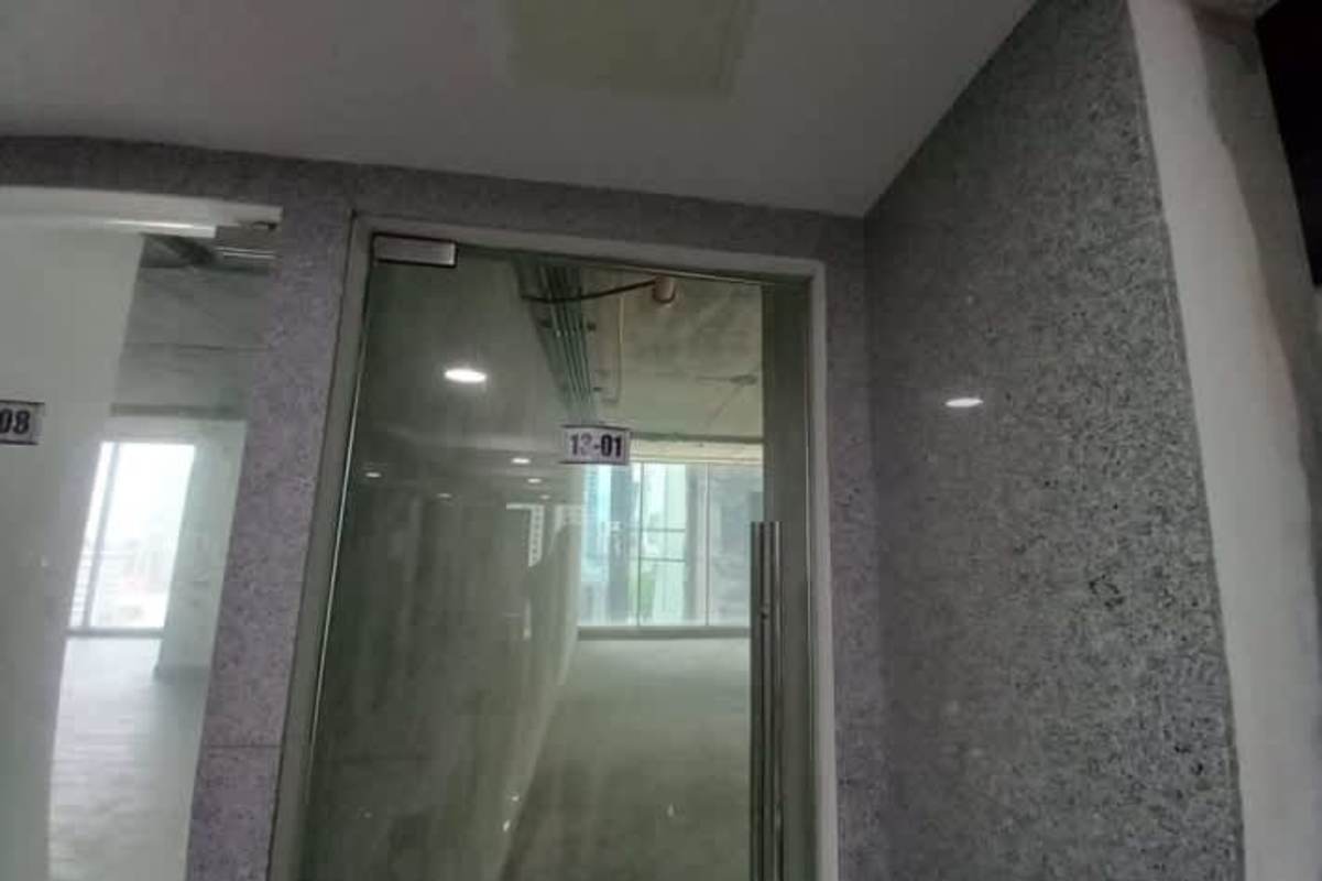 Rough gray unfinished commercial unit with windows city view PH Atrium Tower Obarrio Panama City
