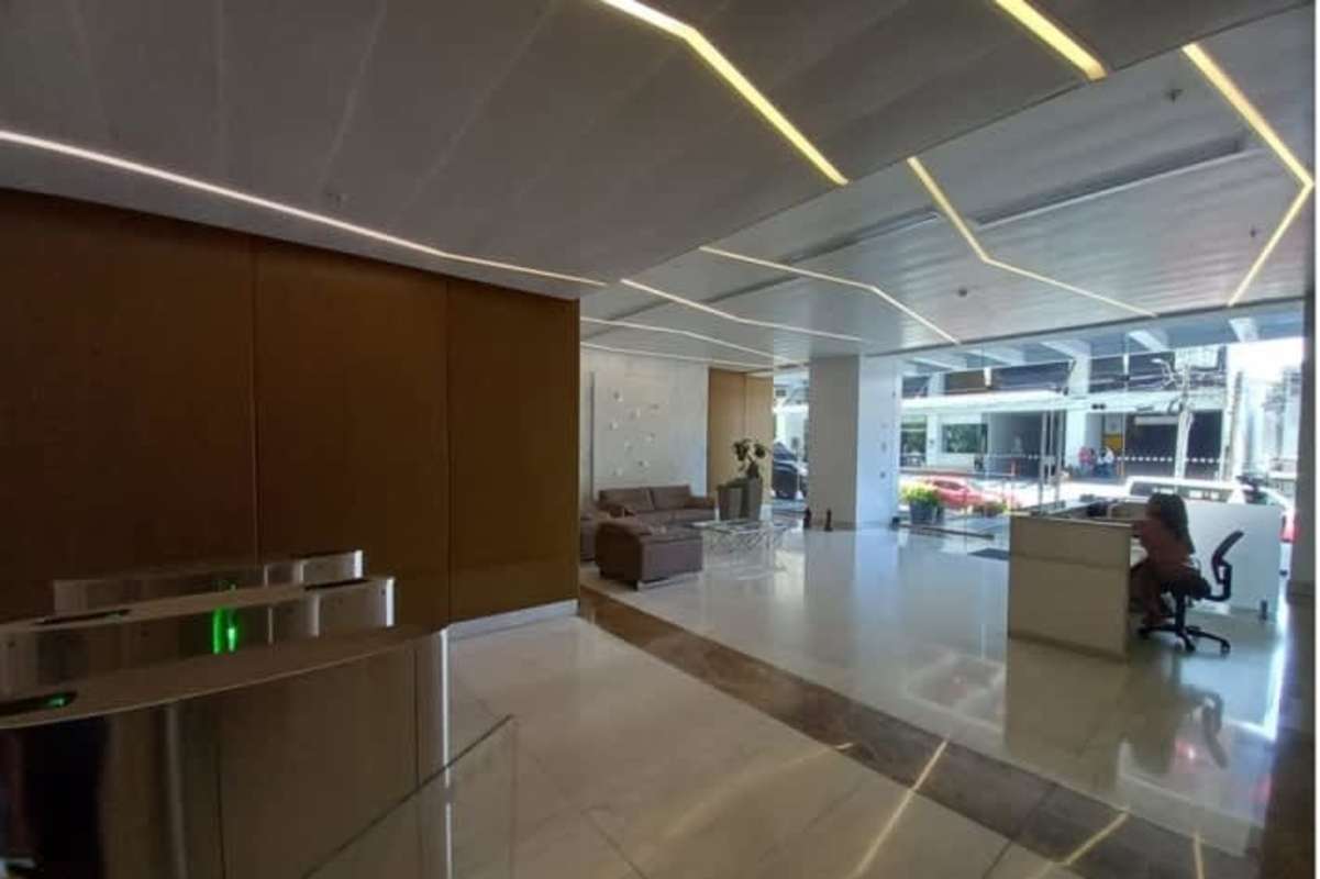 Contemporary lobby with marble floors, LED lighting, seating in PH Atrium Tower Panama City