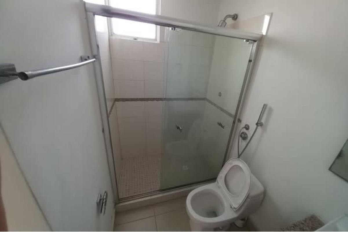 Modern bathroom with granite vanity glass shower Costa Sur Village Panama