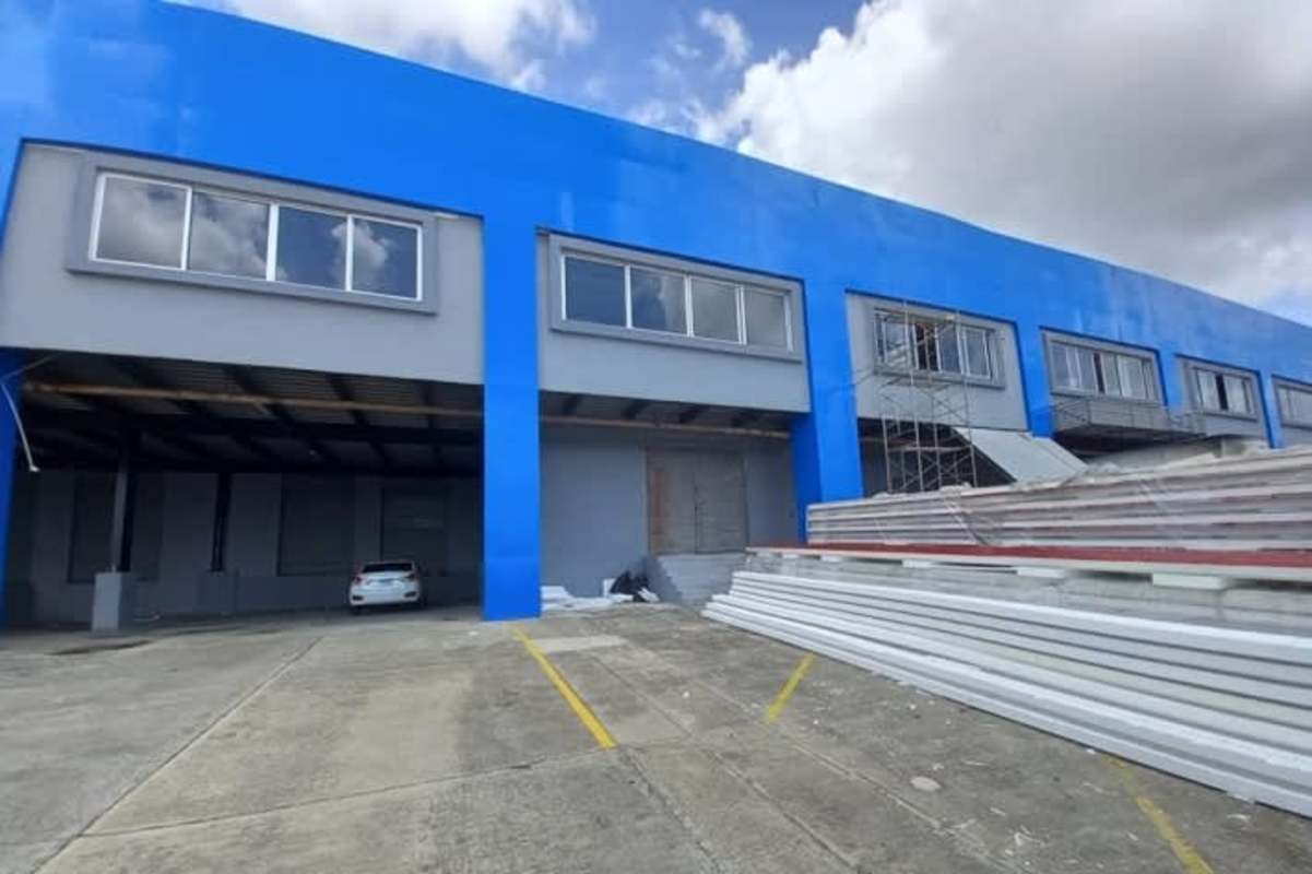Entrance to industrial warehouse with loading ramps in Pacora Las Americas Panama