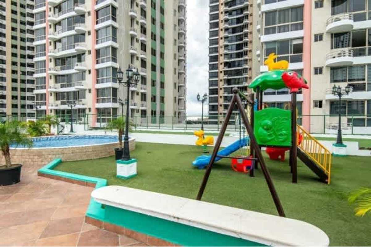 Children playground with swings slides and artificial grass PH San Francisco Bay Panama