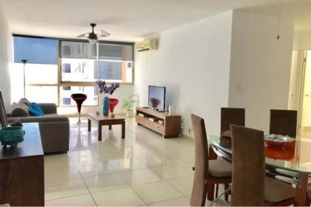 Outdoor pool area, tennis court and playground inside San Francisco Bay Tower E complex Panama City