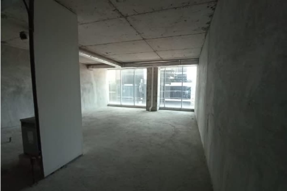 Shell condition interior high ceilings large windows PH Atrium Tower Obarrio Panama