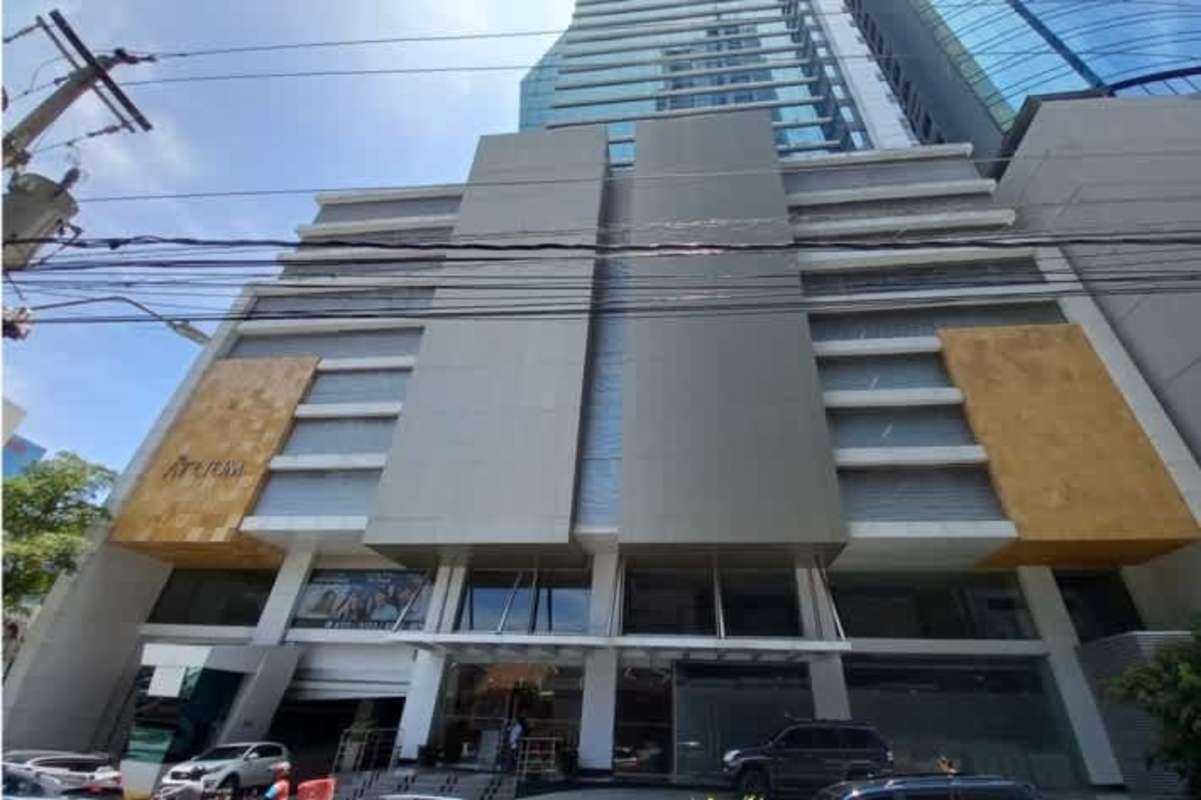 Modern glass facade high-rise commercial building PH Atrium Tower Obarrio Panama City