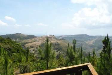 Panoramic mountain views with pine trees and viewing deck in Altos del María Panama