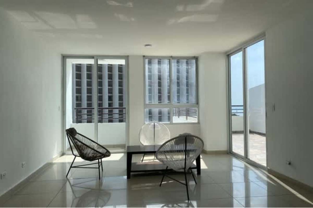 Bright modern living room with balcony skyline views PH San Francisco Bay Panama