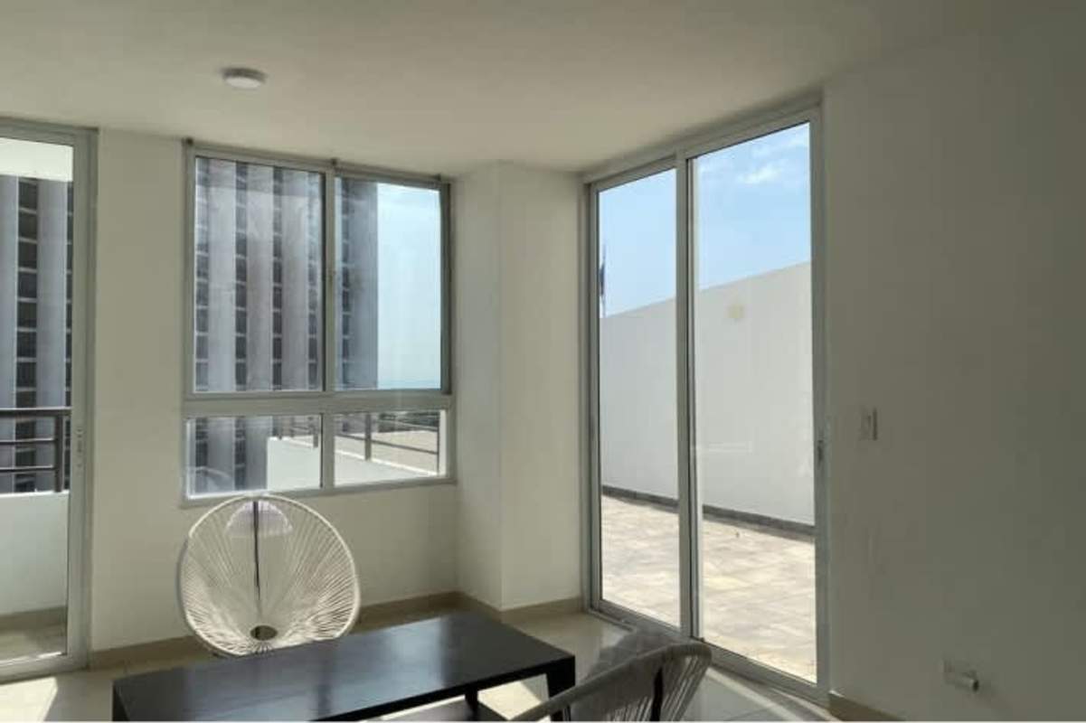 Modern living area bright windows balcony city view PH San Francisco Bay Panama