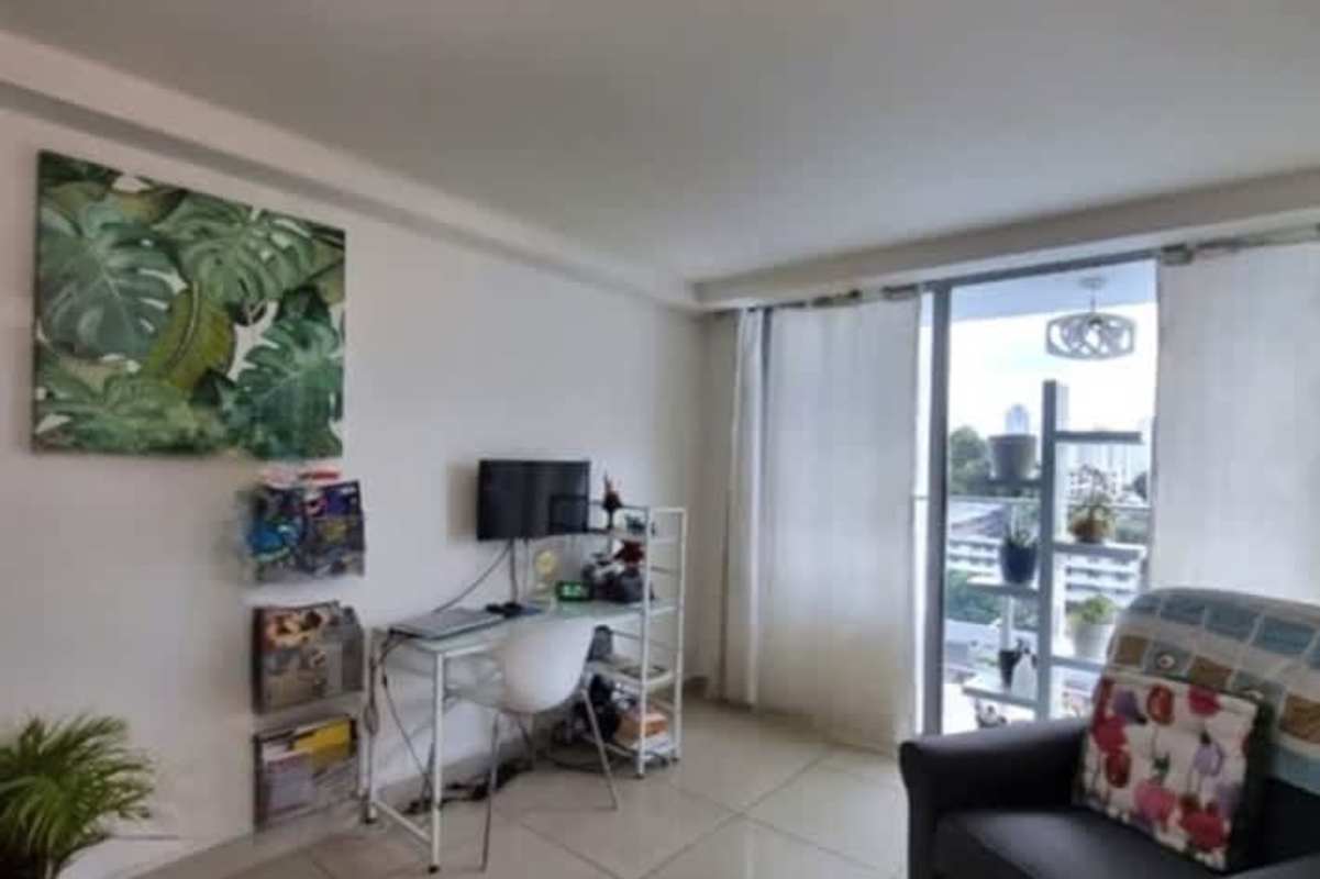 Modern living room with natural light and balcony in PH Torres de Castilla Vía España Panama