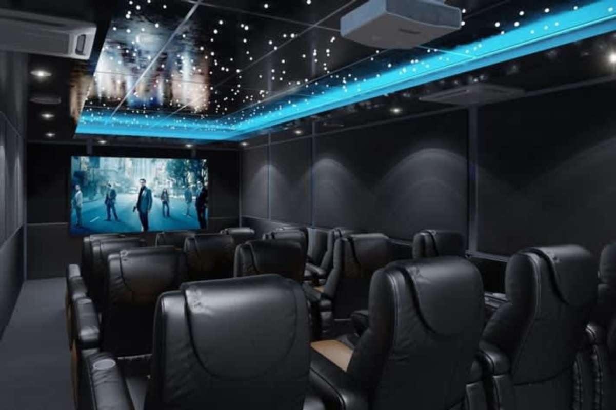 Modern home theater cinema with reclining seats LED ceiling lights BICSA Tower