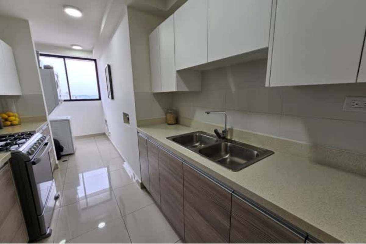 Kitchen with granite counters and modern appliances in PH BICSA Panama City