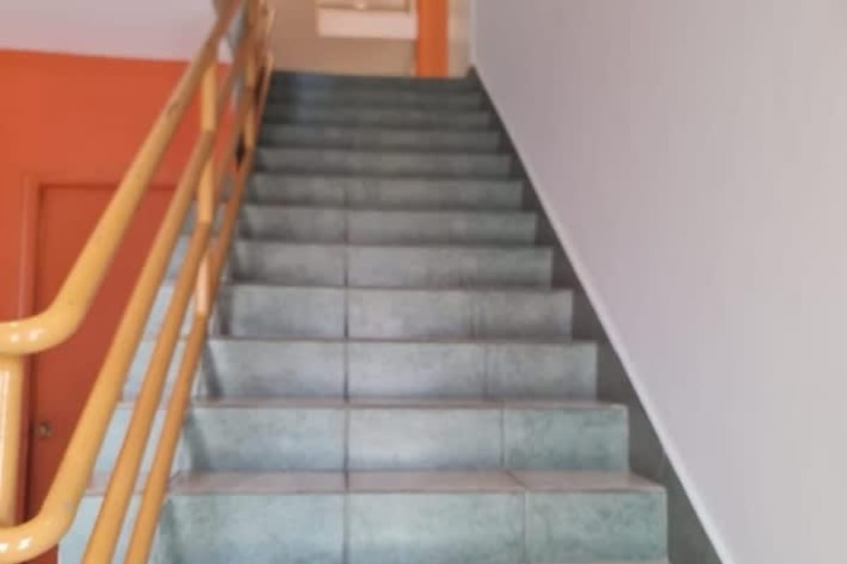 Interior office area with desks, large windows, and bright lighting available in Calle 50 Panama