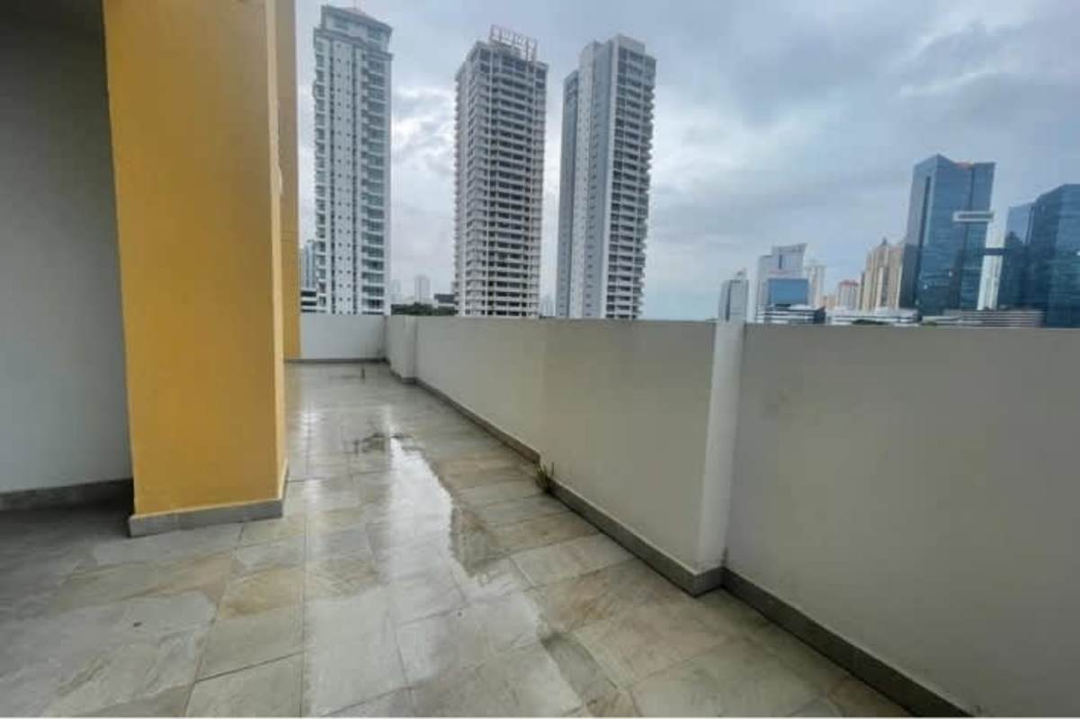 Outdoor balcony with skyline view at PH San Francisco Bay apartment Panama City