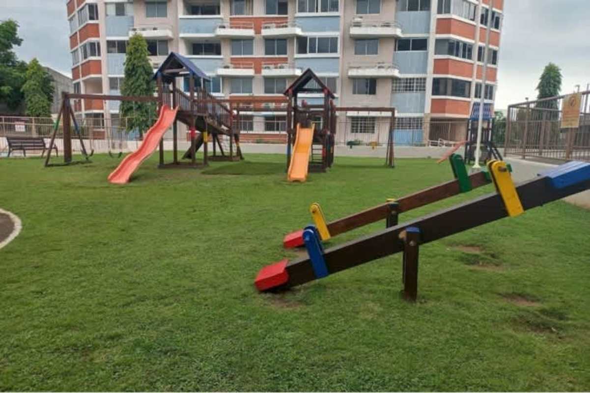 Playground with slides and swings within gated apartment complex Llano Bonito Panama