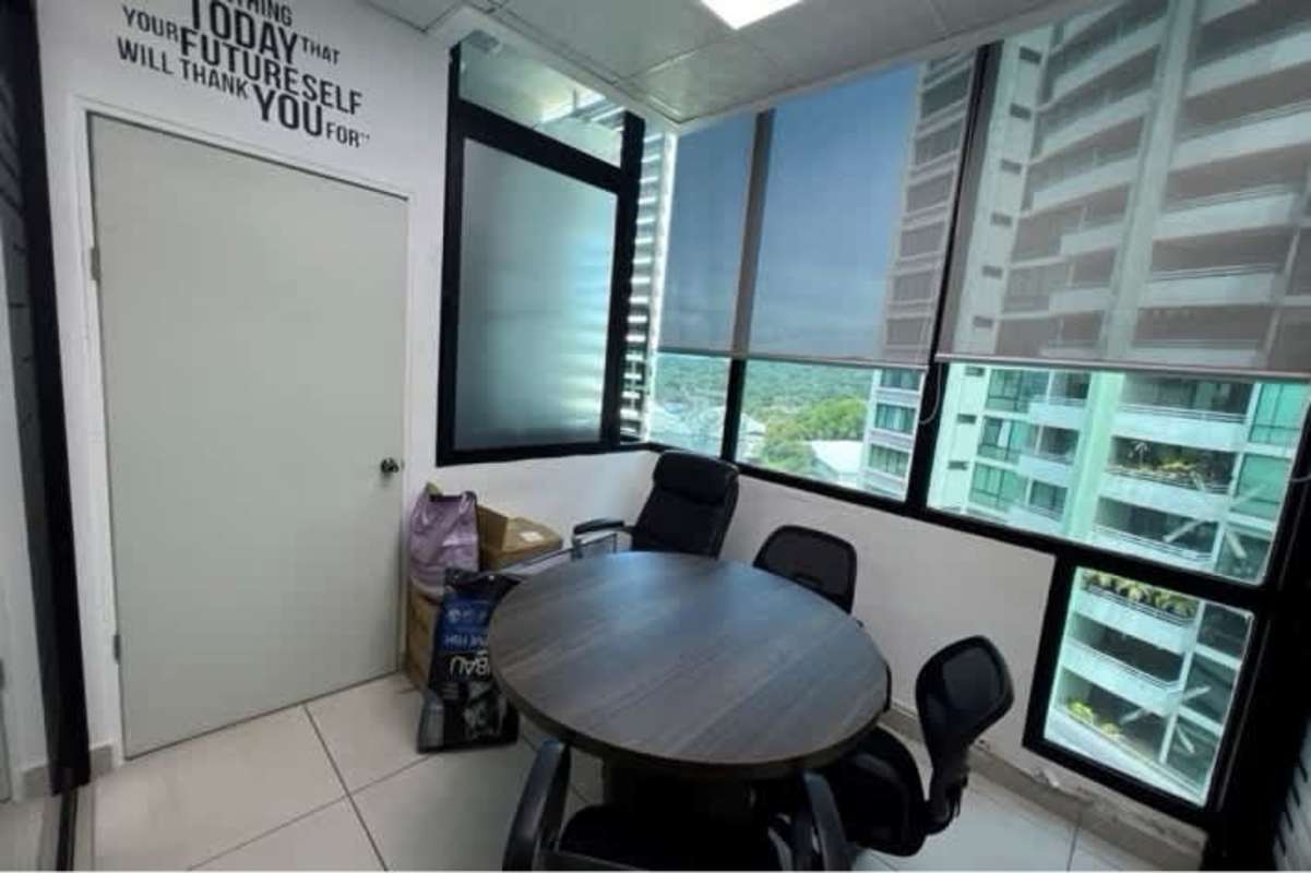 Office reception waiting area with modern glass partition Edison Corporate Center Panama City