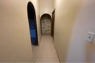 Mediterranean covered patio with terracotta tiles garden view Punta Barco Panama