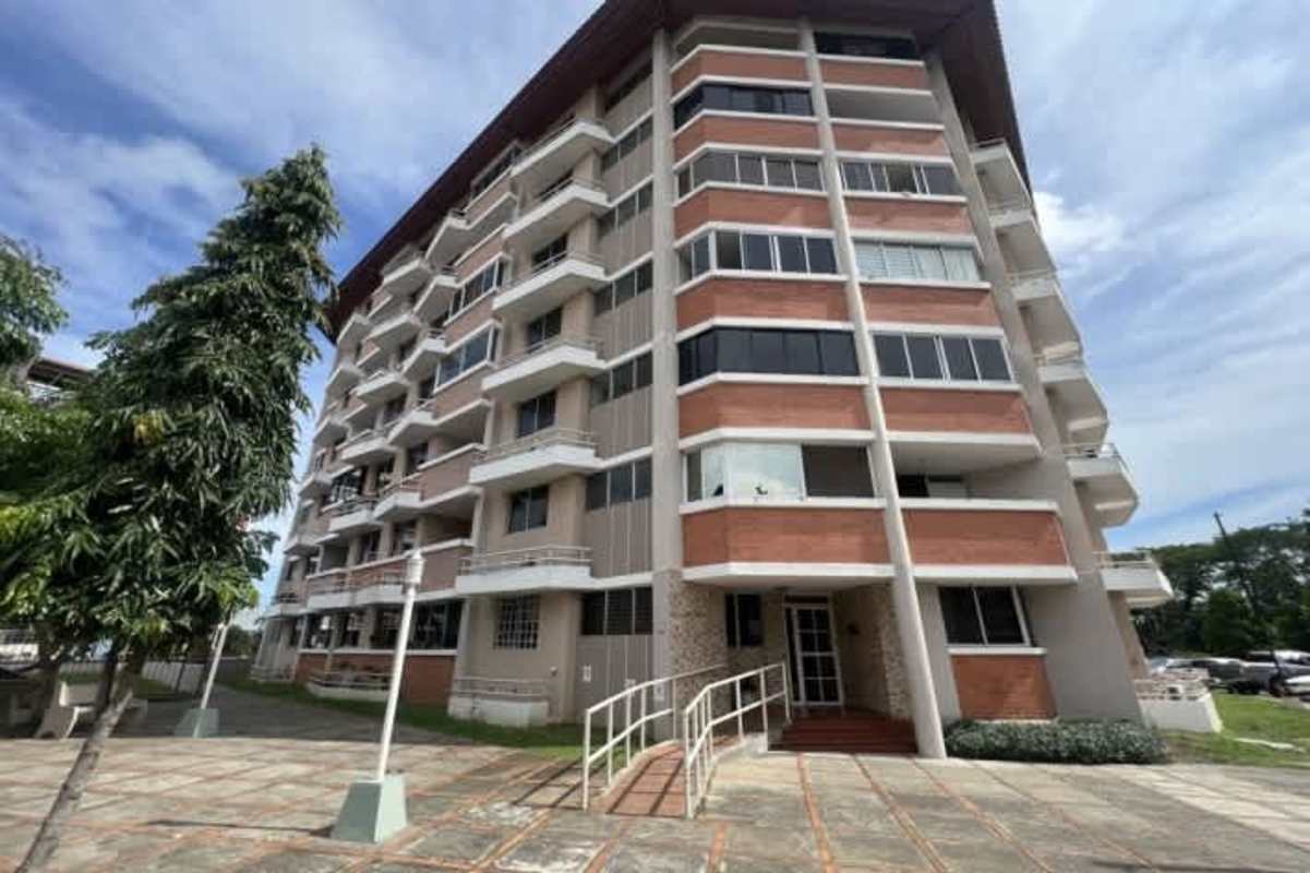 Multi-story apartment building exterior with balconies Llano Bonito Panama