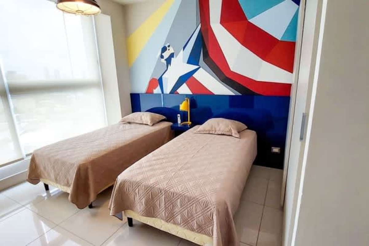 Bedroom with large window and modern decor PH Bali Panama