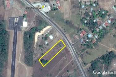 Aerial image commercial land near airport and Santiago Mall with outlined parcel