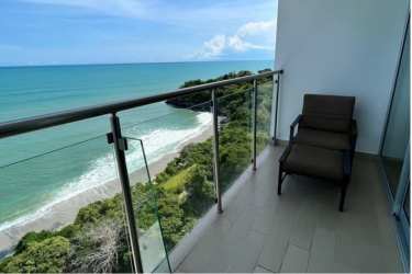 Drone view of PH Royal Palm condominium complex along the Pacific Ocean beach in San Carlos Panama