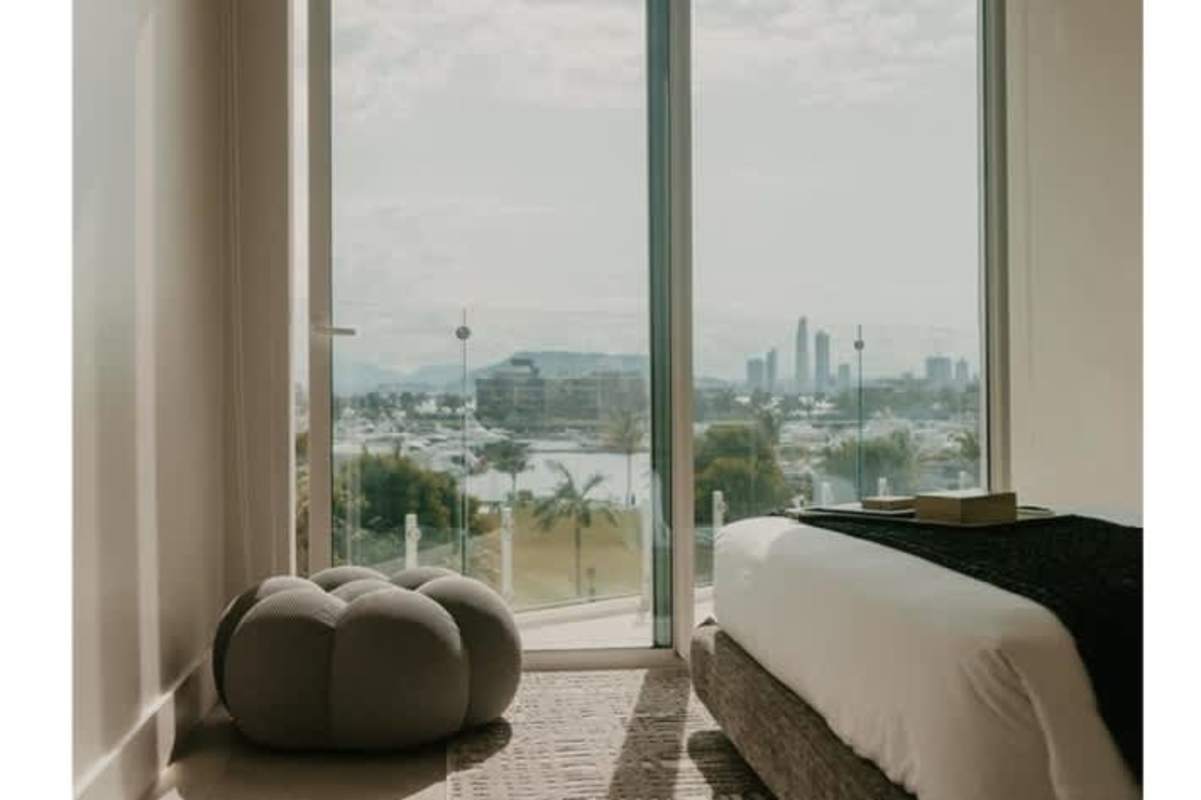 En suite bathroom with built-in closets, vanity and natural decor in Ocean Reef Island II Panama