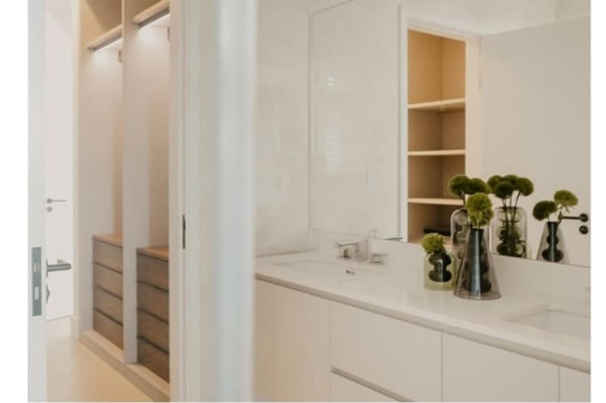 Contemporary kitchen with integrated appliances, quartz countertops in Ocean Reef Island II Panama City