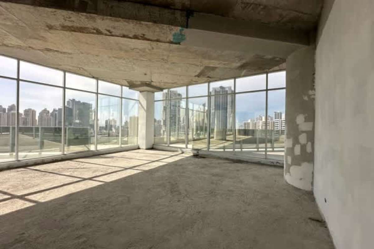 Open unfinished office corner ready for customization with skyline views FF Tower Panama