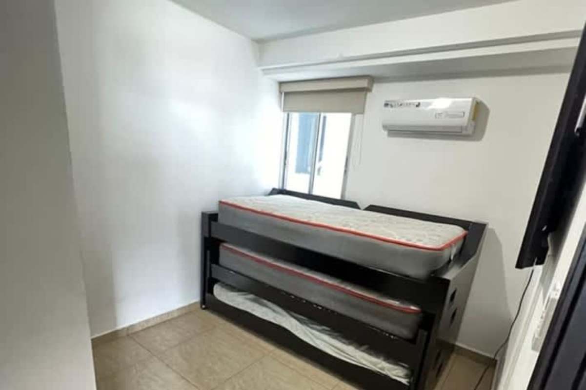 Compact bedroom with stacked bunk beds, AC PH Torres de Carrasquilla San Francisco Panama