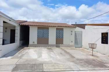 Single-story house front paved driveway Park Village Arraiján Panama