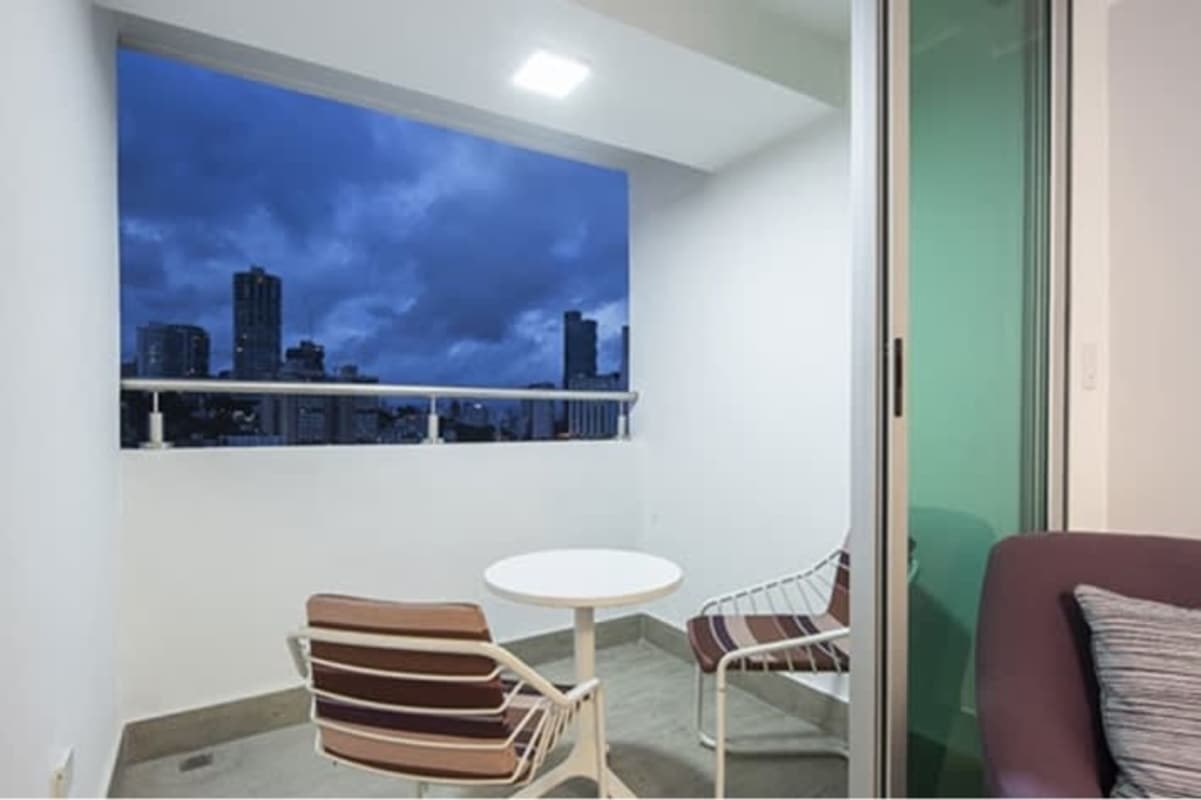 Spacious balcony with railing and panoramic city and ocean views at PH Altamira Residences, Avenida Balboa