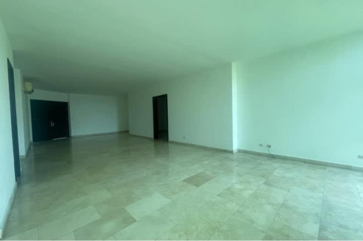 Modern spacious living room with balcony access and garden view PH Embassy Club Clayton Panama