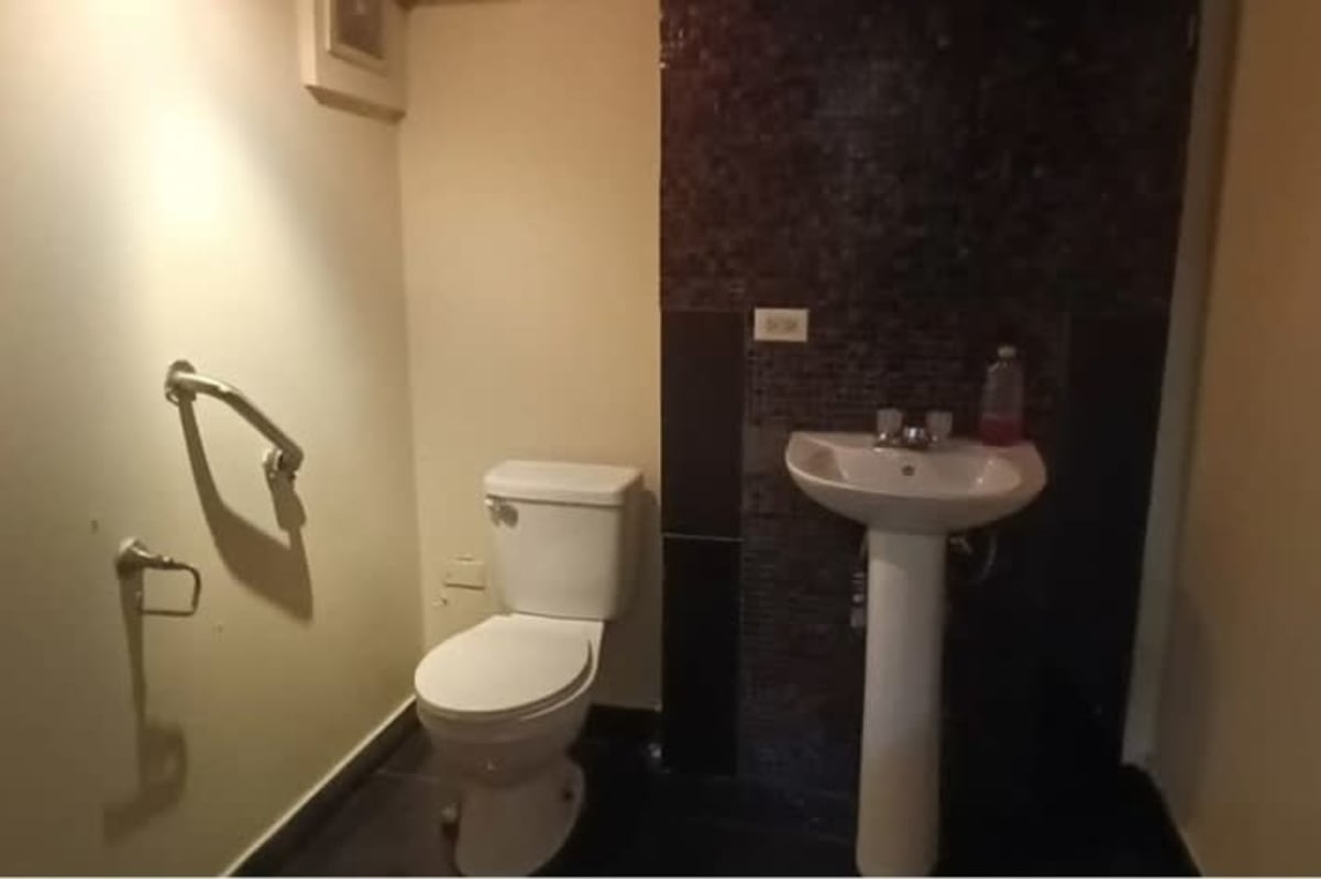 Commercial kitchen area with vent hood cold room PH Vitro Loft Studio Panama City