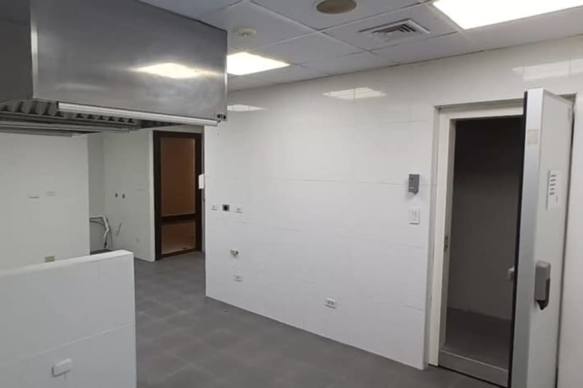 Open double height commercial showroom interior luxury porcelain floors in El Cangrejo Panama