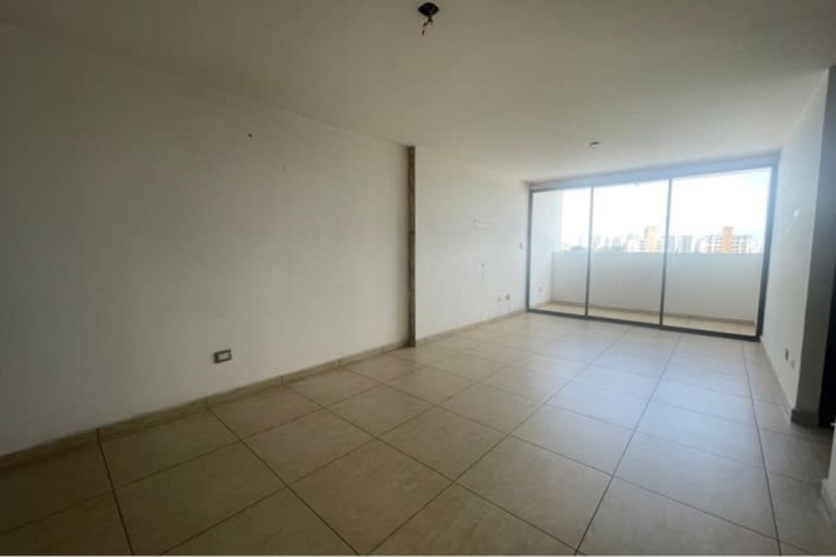 Modern kitchen granite countertop dark cabinetry apartment Condado Country Club Panama City